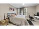 Cozy bedroom with a comfortable bed, soft lighting, and large windows for natural light at 104 Sierra Dr, Chapel Hill, NC 27514