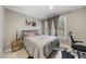 Bright bedroom with a comfortable bed, desk, and windows for natural light at 104 Sierra Dr, Chapel Hill, NC 27514