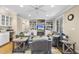 Inviting living room with built-in shelving, a fireplace, and cozy gray sofas at 104 Sierra Dr, Chapel Hill, NC 27514