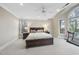 Spacious bedroom features a ceiling fan, two windows, and an area for exercise equipment at 104 Sierra Dr, Chapel Hill, NC 27514