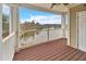 View of the balcony with a water view and white railings and support columns at 10411 Rosegate Ct # 304, Raleigh, NC 27617