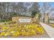 Brier Creek Country Club entrance sign set among bright floral arrangements at 10411 Rosegate Ct # 304, Raleigh, NC 27617