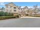 Charming townhome complex with well-maintained landscaping and convenient attached garages at 10411 Rosegate Ct # 304, Raleigh, NC 27617