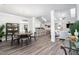 Open-concept dining area offering a modern aesthetic with views into the kitchen and living room at 1053 Beechcraft Dr # 124, Mebane, NC 27302