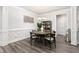 Cozy dining room with elegant chandelier and space for a six person table at 1053 Beechcraft Dr # 124, Mebane, NC 27302