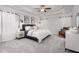 This is a spacious main bedroom featuring neutral tones, carpet, and tray ceilings that enhance the ambiance at 1053 Beechcraft Dr # 124, Mebane, NC 27302