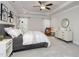 The main bedroom is complemented by a tray ceiling and a seating area, enhancing its luxury and comfort at 1053 Beechcraft Dr # 124, Mebane, NC 27302