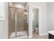 The elegant bathroom features a glass-enclosed shower and a separate toilet room at 109 Belle Plain Dr, Morrisville, NC 27560