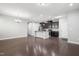 Open kitchen design with stainless steel appliances and an island, connected to a dining space at 109 Belle Plain Dr, Morrisville, NC 27560
