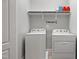 Well-equipped laundry room with modern washer and dryer for efficient home maintenance at 109 Belle Plain Dr, Morrisville, NC 27560