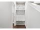 Convenient mudroom with built-in storage, bench seating, and coat hooks at 109 Belle Plain Dr, Morrisville, NC 27560