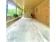 Spacious carport with brick support columns for covered parking at 1115 Park Ave, Henderson, NC 27536