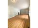 Spacious living room featuring a fireplace and gleaming hardwood floors at 1115 Park Ave, Henderson, NC 27536