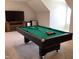 Bright game room with a pool table, entertainment center, and mini-fridge for convenience at 149 Steep Rock Dr, Willow Springs, NC 27592