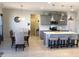 Modern kitchen with an island, stainless steel appliances, and stylish pendant lighting at 149 Steep Rock Dr, Willow Springs, NC 27592