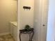 Bright laundry room features a modern washer and dryer with convenient storage solutions at 149 Steep Rock Dr, Willow Springs, NC 27592