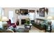 Comfortable living room featuring a fireplace and a view of the back yard at 1516 Bradsher Dr, Stem, NC 27581