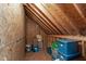 Unfinished attic space ready for storage, featuring exposed wood framing and ample room for organization at 1721 Frenchwood Dr, Raleigh, NC 27612