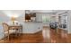 Open concept living space with hardwood floors, a modern chandelier, and lots of light at 1721 Frenchwood Dr, Raleigh, NC 27612
