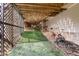 The underside of the back deck features a lawn area and provides additional storage or utility space at 1721 Frenchwood Dr, Raleigh, NC 27612