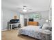 Cozy bedroom with a ceiling fan, desk, and a dresser at 1801 Irish Blvd, Sanford, NC 27332