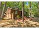 Charming exterior with brick accents and lush, colorful landscaping at 1801 Irish Blvd, Sanford, NC 27332