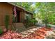 Charming front entrance with an American flag and lush landscaping at 1801 Irish Blvd, Sanford, NC 27332
