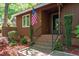 Close up view of a welcoming front porch with American flag at 1801 Irish Blvd, Sanford, NC 27332