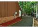 Exterior view of home showing the garage and tree lined driveway at 1801 Irish Blvd, Sanford, NC 27332