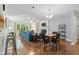 Bright living room featuring hardwood floors, a dining area and stylish decor at 1801 Irish Blvd, Sanford, NC 27332