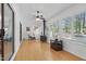 Bright sunroom with lots of windows, a ceiling fan and wood-look floors at 1801 Irish Blvd, Sanford, NC 27332