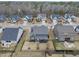 An aerial view of a neighborhood with similar house designs and well-maintained yards at 1916 Edens Ridge Ave, Wake Forest, NC 27587