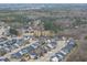 A neighborhood surrounded by forest in an aerial view at 1916 Edens Ridge Ave, Wake Forest, NC 27587