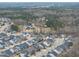 Panoramic aerial view of residential neighborhood surrounded by lush woods at 1916 Edens Ridge Ave, Wake Forest, NC 27587