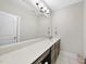 A spacious bathroom featuring a large mirror and vanity with great lighting at 1916 Edens Ridge Ave, Wake Forest, NC 27587