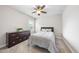 Cozy bedroom with a ceiling fan, carpet and a large dresser at 1916 Edens Ridge Ave, Wake Forest, NC 27587