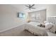 A cozy bedroom with a soft bed, hanging chair, and a TV at 1916 Edens Ridge Ave, Wake Forest, NC 27587