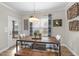 Bright dining area with modern table, bench, and charming decor at 1916 Edens Ridge Ave, Wake Forest, NC 27587