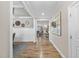 Inviting foyer with hardwood floors, decorative accents, and an open view into the living spaces at 1916 Edens Ridge Ave, Wake Forest, NC 27587