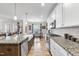 Beautiful kitchen featuring granite countertops, stainless steel appliances, and an open layout at 1916 Edens Ridge Ave, Wake Forest, NC 27587