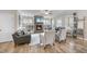 Spacious living room with a stone fireplace, comfortable seating, and hardwood flooring throughout at 1916 Edens Ridge Ave, Wake Forest, NC 27587
