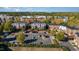 Aerial view showcasing the neighborhood's charming apartments, parking, and lush greenery at 201 Finsbury St # 201, Durham, NC 27703
