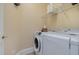 Functional laundry room equipped with modern washer and dryer, providing convenience and organization at 201 Finsbury St # 201, Durham, NC 27703