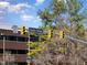 Street view featuring Davis Drive sign and traffic lights, near offices and mature trees under a blue sky at 201 Finsbury St # 201, Durham, NC 27703