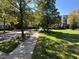 Scenic street view of the neighborhood, highlighting sidewalks, trees, and well-maintained lawns at 201 Finsbury St # 201, Durham, NC 27703