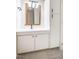 Bathroom featuring vanity with white countertop and black accents at 220 Elizabeth St # F-2, Chapel Hill, NC 27514