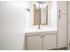 Bathroom featuring vanity with white countertop and black accents at 220 Elizabeth St # F-2, Chapel Hill, NC 27514