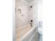 Modern bathroom featuring white marble tiled shower and black fixtures for a sleek and stylish design at 220 Elizabeth St # F-2, Chapel Hill, NC 27514