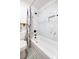 Modern bathroom featuring white marble tiled shower and black fixtures for a sleek and stylish design at 220 Elizabeth St # F-2, Chapel Hill, NC 27514