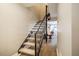 Bright staircase featuring a modern railing design and leading to the upper level at 220 Elizabeth St # F-2, Chapel Hill, NC 27514